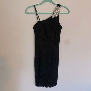 Brand City Triangles. Color black with sparkly black floral lace. Size 3